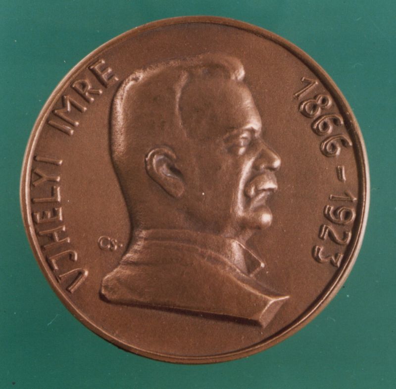 érem